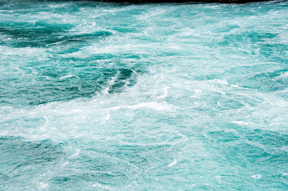 The Fast Flowing Waikato River at Huka Falls near Taupo North Island New Zealand